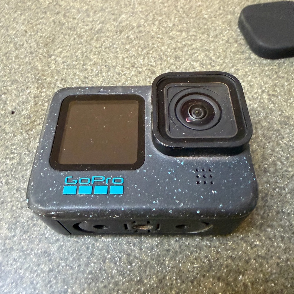 GoPro 12 Action Camera - Speckled Black with Teal Logo